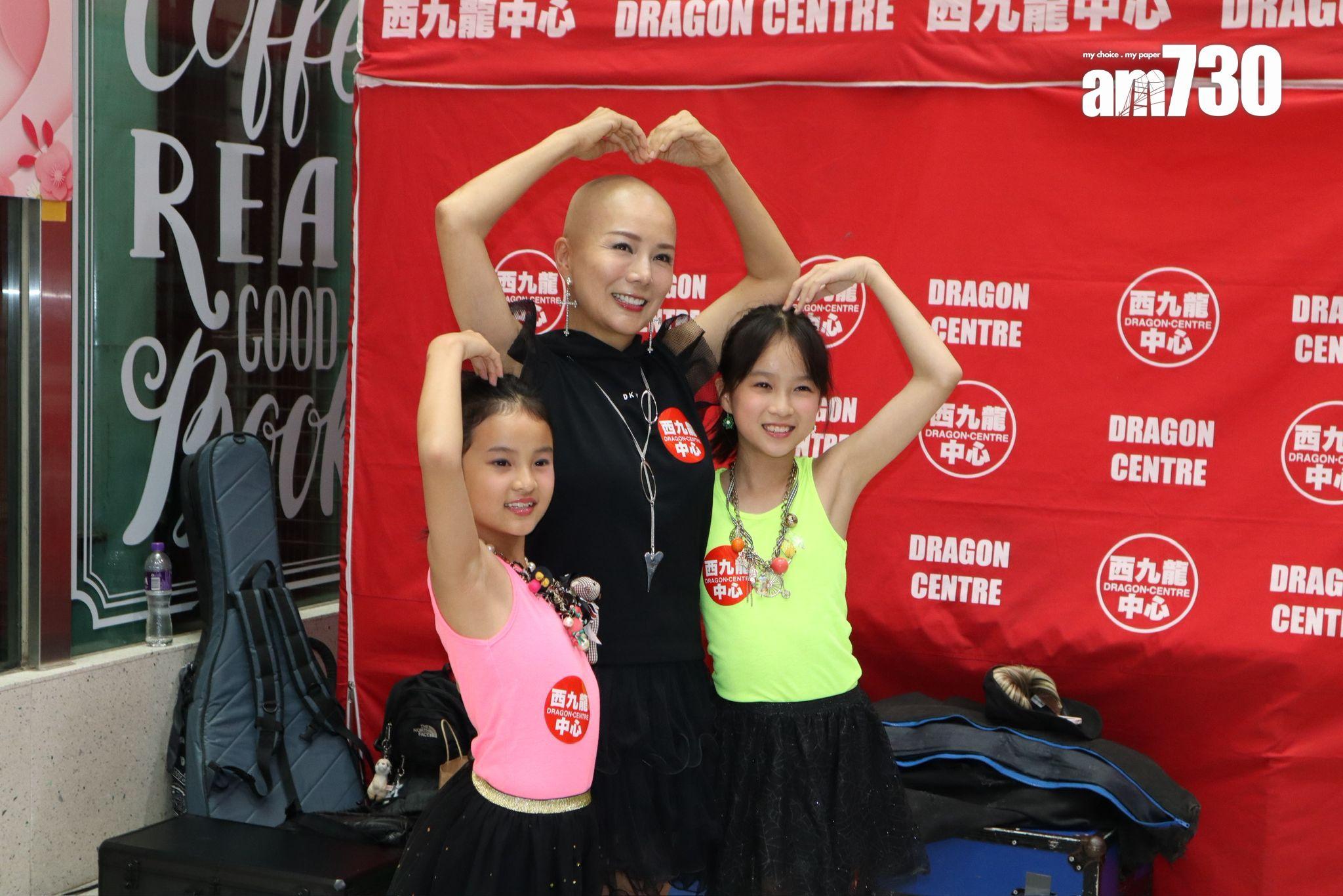 吳文忻離婚前曾與兩位可愛女兒一起出席活動。(娛樂組攝)