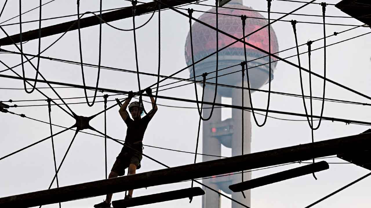 內地上季經濟增長5.2%,放緩速度較預期慢。(資料圖片)