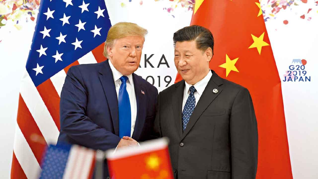 報道指特朗普擬11月APEC前訪華,冀解決中美關稅戰。圖為特朗普與國家主席習近平。(路透社資料圖片)