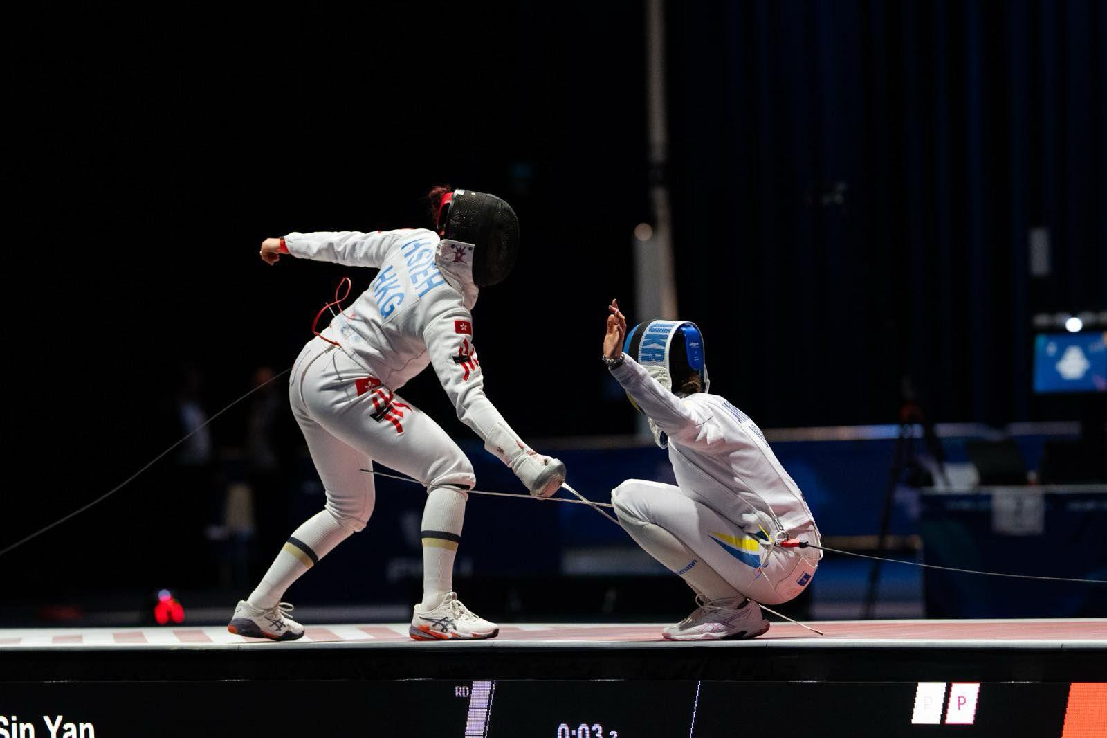 佘繕妡成功衛冕女子重劍奪港隊首金。(世大運官網)