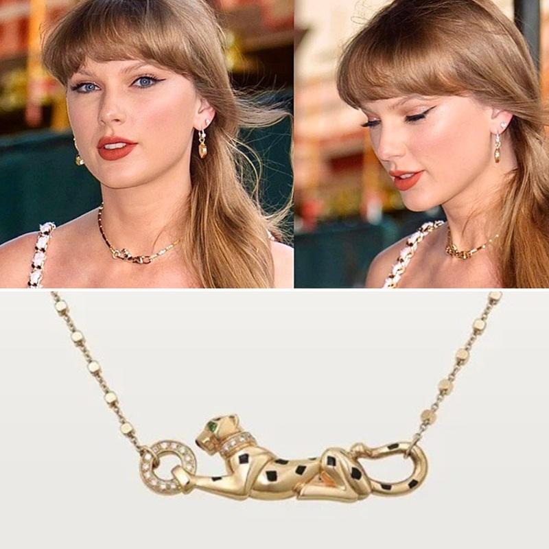 Taylor身上盡是貴價名牌,尤其是頸上的卡地亞鑽鍊。