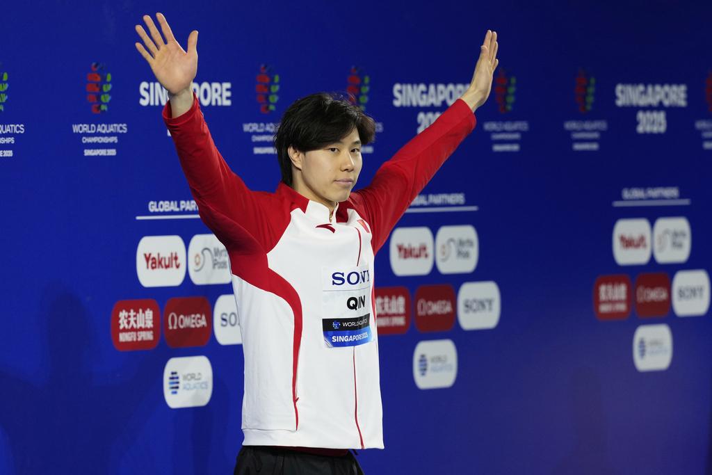 覃海洋在男子100米蛙泳封王,奪得中國隊在今屆游泳世錦賽的首面游泳金牌。(美聯社)