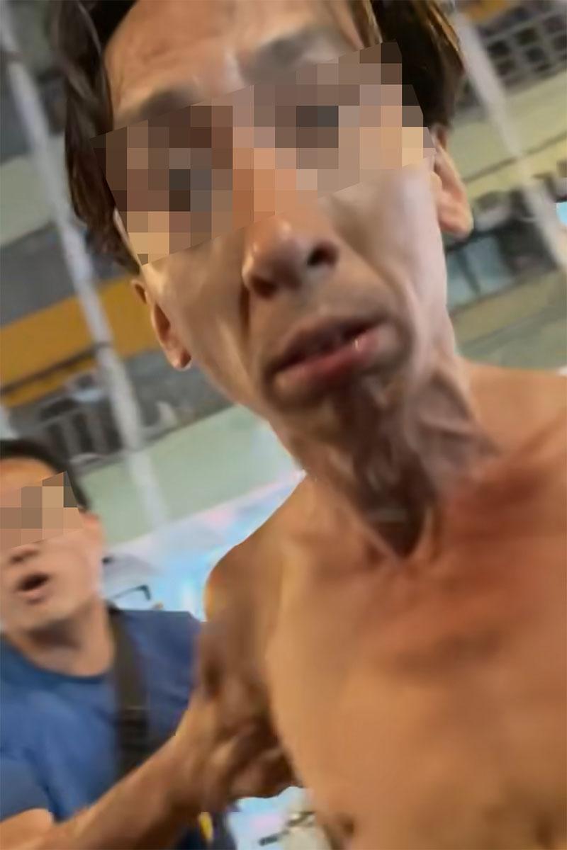 有司機在享和街與鄰近車房職員,因停泊咪錶位問題發生爭執。(網上影片截圖)