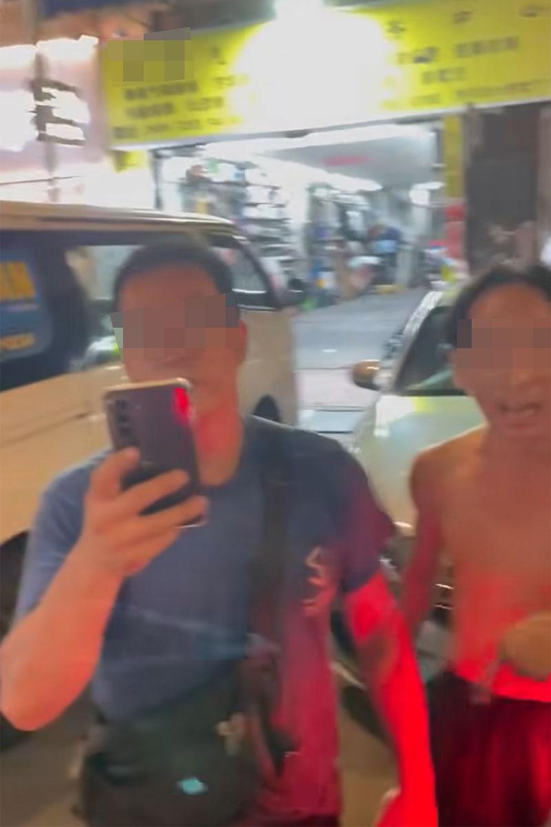 有司機在享和街與鄰近車房職員,因停泊咪錶位問題發生爭執。(網上影片截圖)