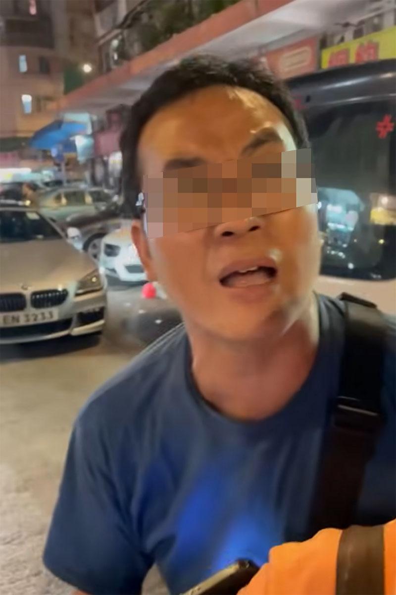 有司機在享和街與鄰近車房職員,因停泊咪錶位問題發生爭執。(網上影片截圖)