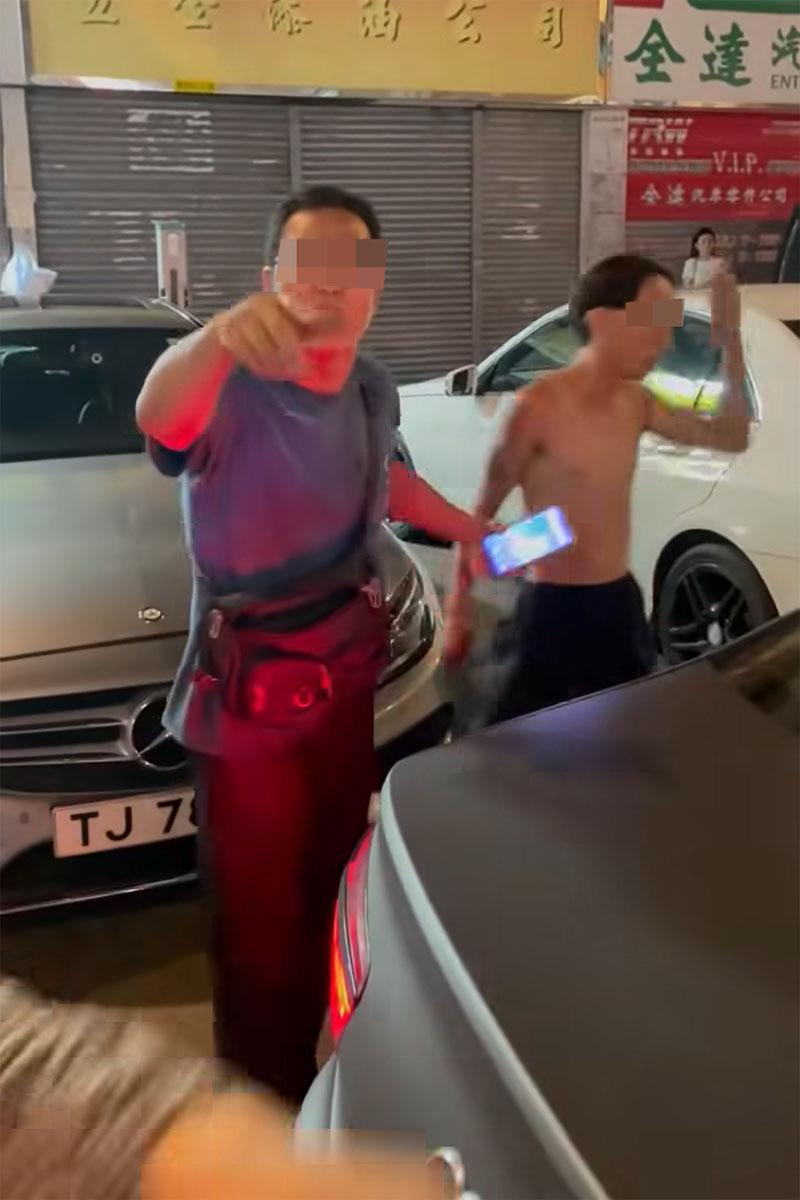 有司機在享和街與鄰近車房職員,因停泊咪錶位問題發生爭執。(網上影片截圖)