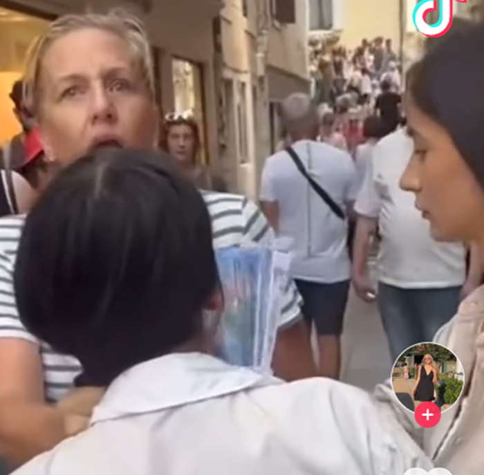 一名美國遊客在威尼斯被偷銀包,靠AirPods捉女賊,並抓緊後者馬尾等待警員到場。(互聯網)