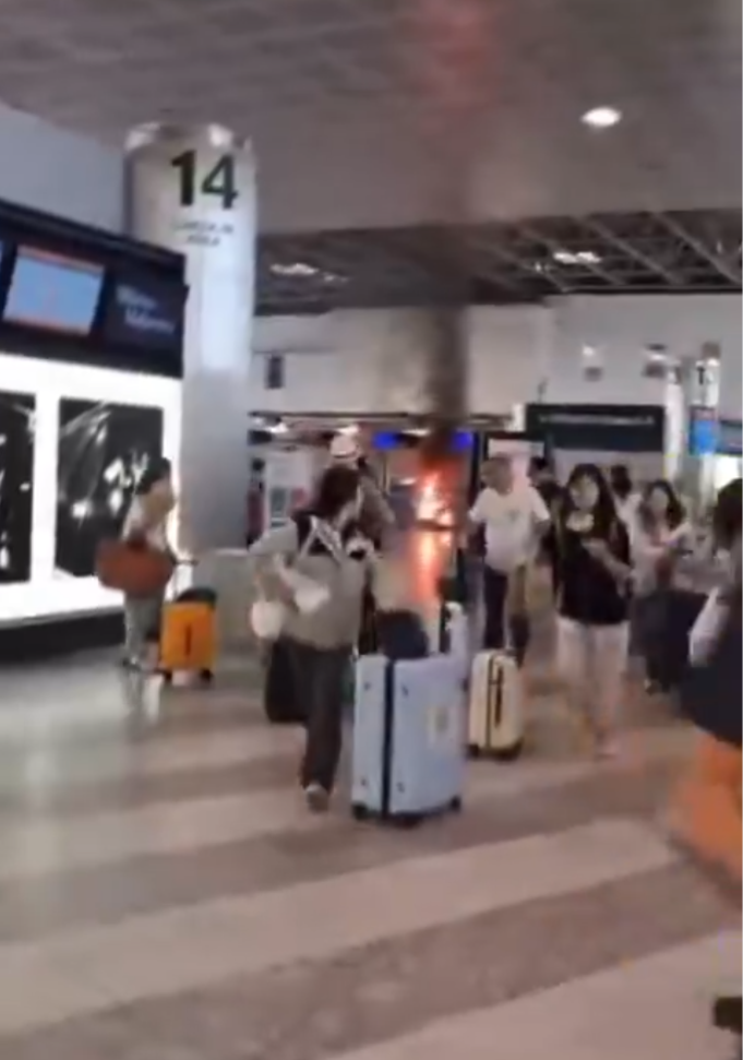 男子米蘭機場放火拿鐵鎚怒砸 旅客慌忙拖喼逃離 勇漢持滅火筒制服兇徒(有片)