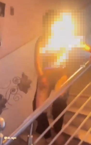 Nikki半身著女,衣褲都被燒爛。(X)