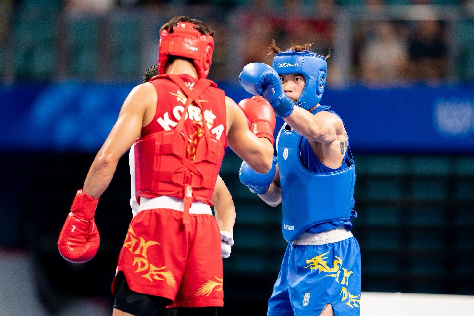 成都世界運動會|散打張溢霖力戰摘銀 香港隊今屆第5面獎牌。(港協暨奧委會提供)