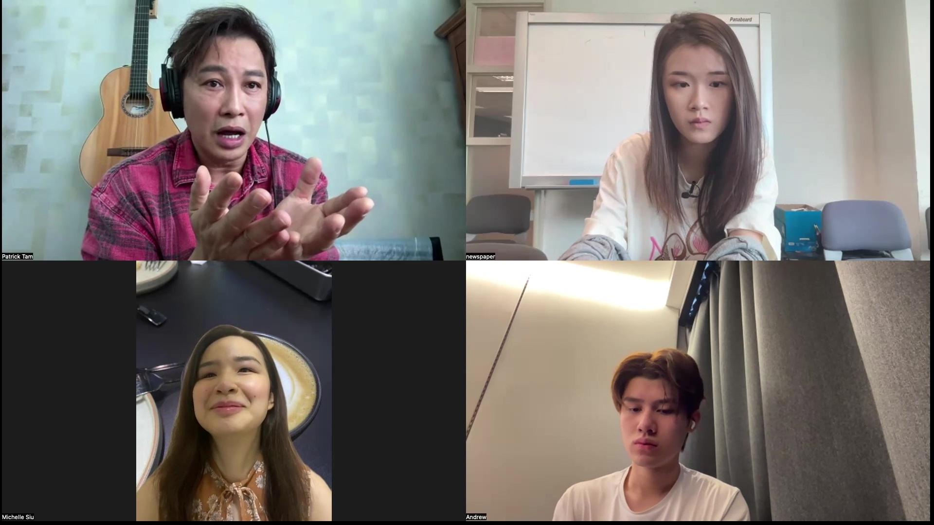 譚耀文透過視像,認真教道3位學員。