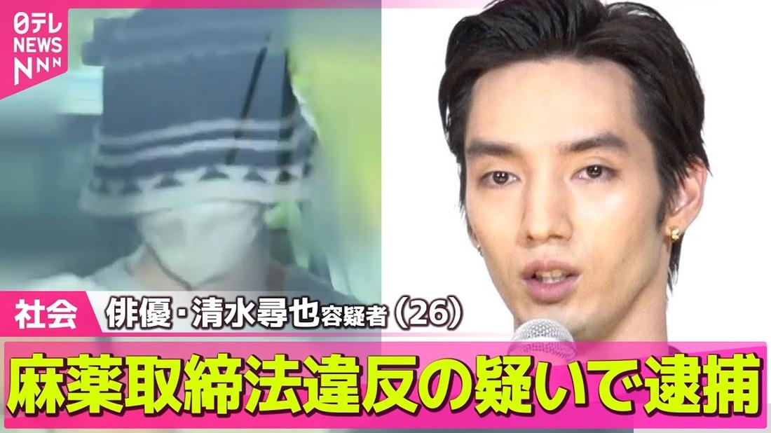 清水坐上警車被還押,戴帽和口罩遮晒面部。