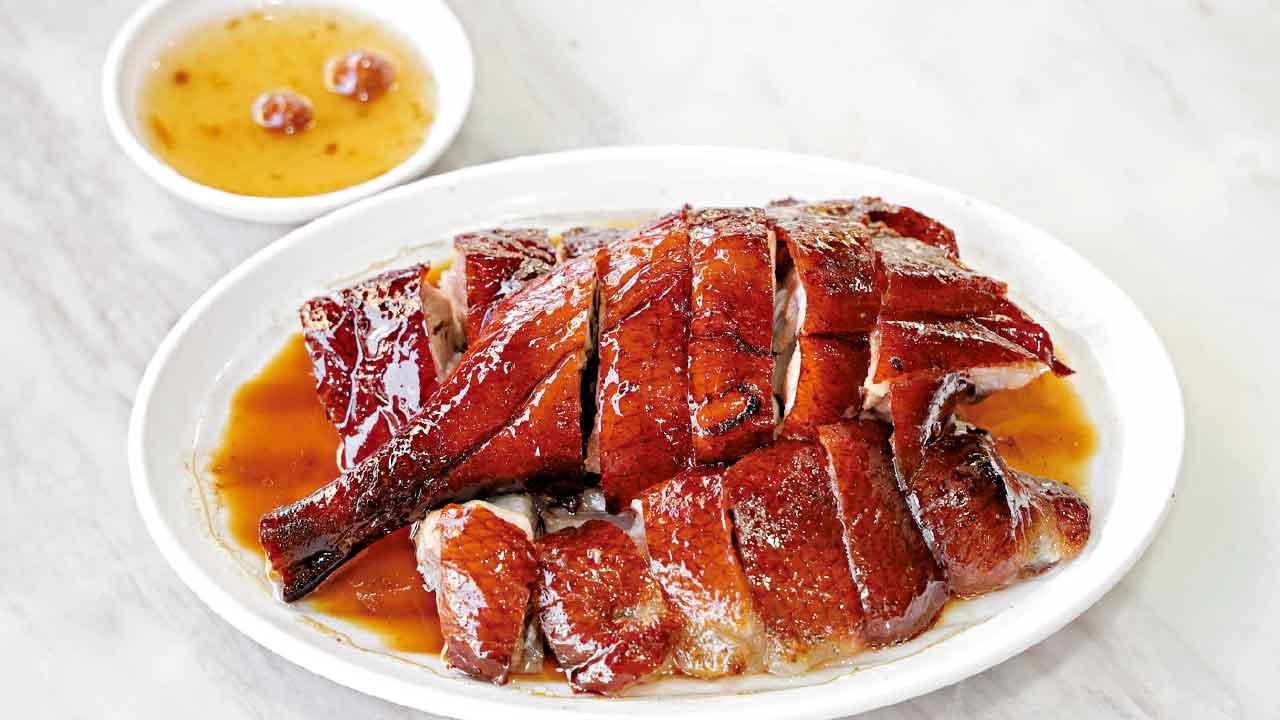 陳記燒鵝色澤均勻,皮脆肉滑。(例牌下庄$248)