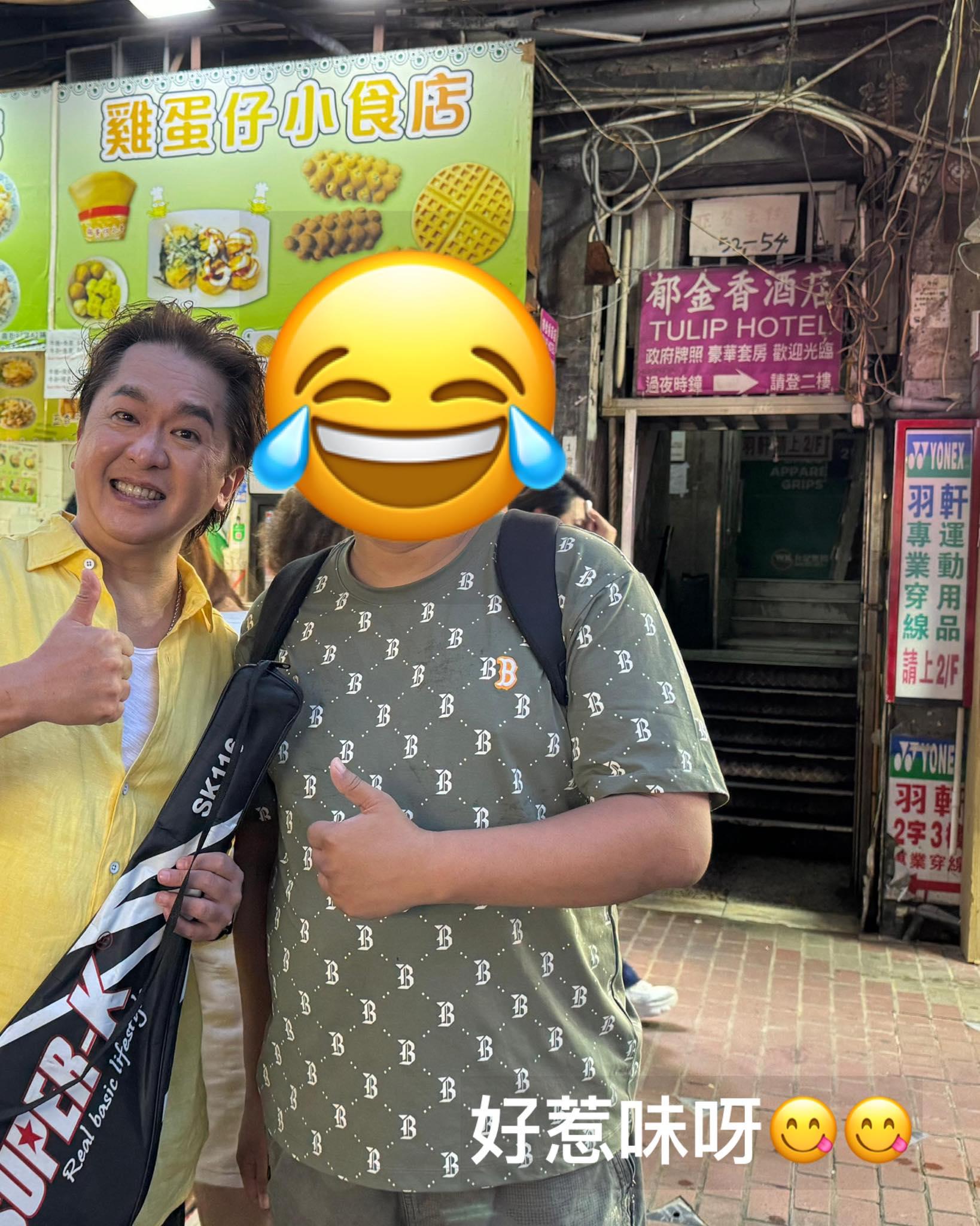 有途人在建興大廈遇到兆尊,要求合照他亦大方應承。