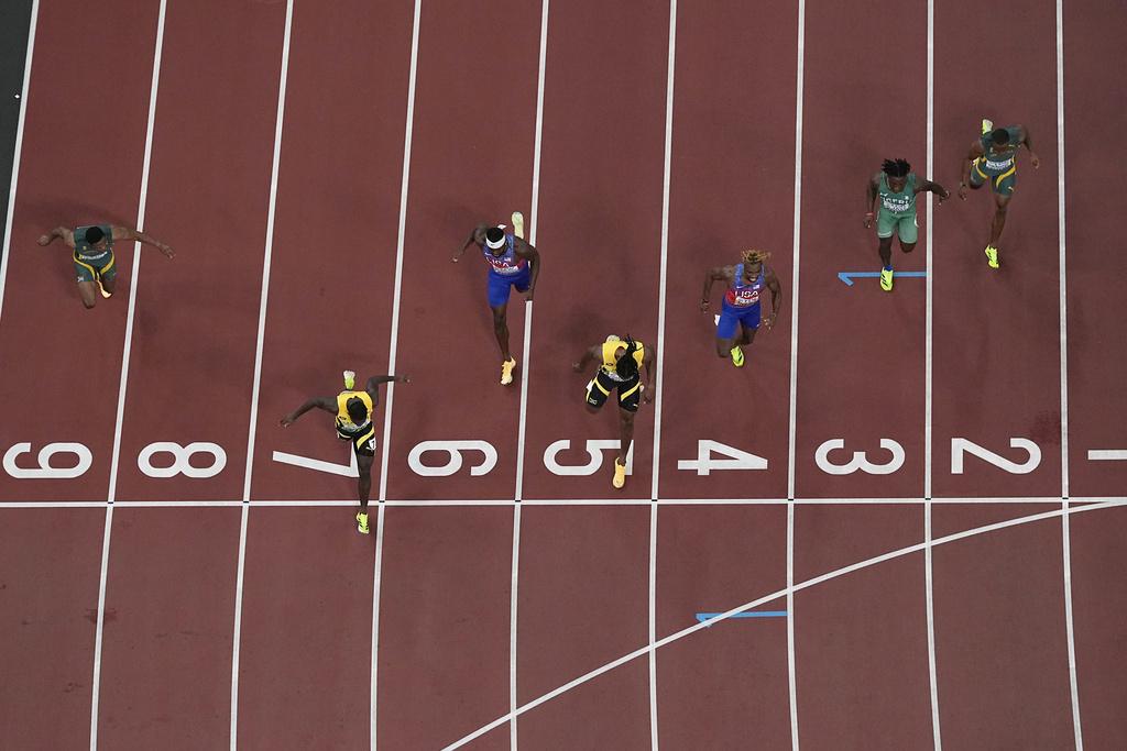 施維爾為牙買加相隨10年再贏世錦賽百米飛人冠軍。(美聯社)