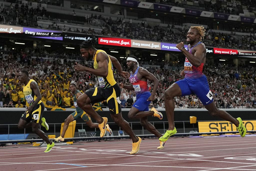 施維爾為牙買加相隨10年再贏世錦賽百米飛人冠軍。(美聯社)