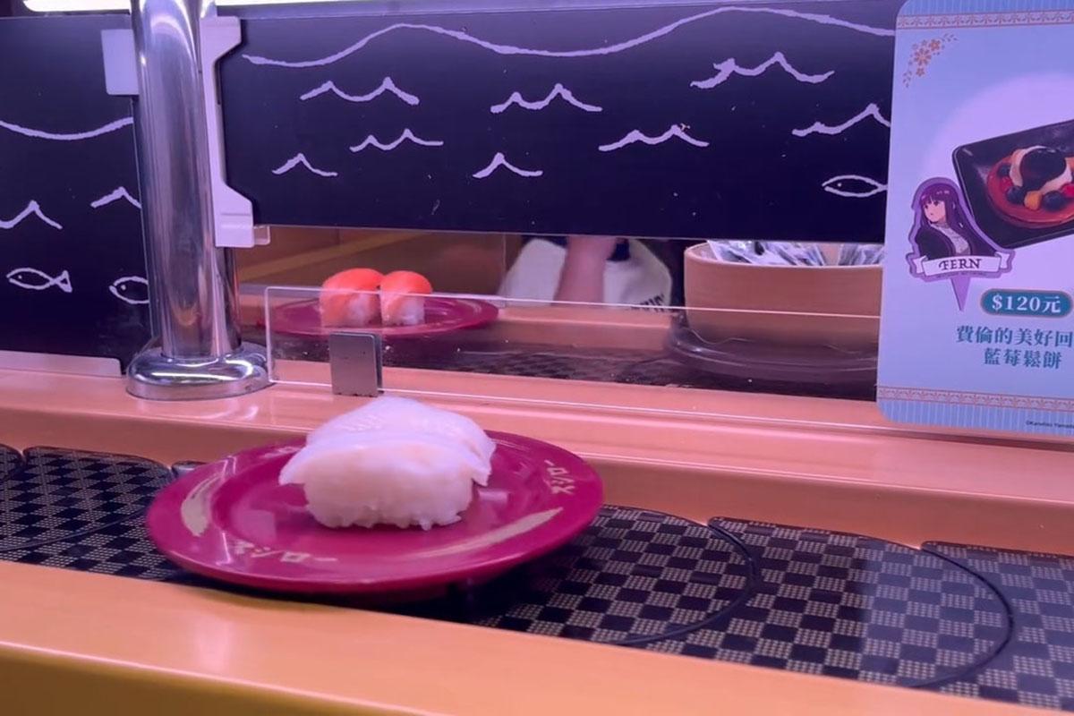 台中一間壽司郎有兒童把筷子伸到迴轉帶上,擋住一碟三文魚壽司。(Threads用戶rain__0808__影片截圖)