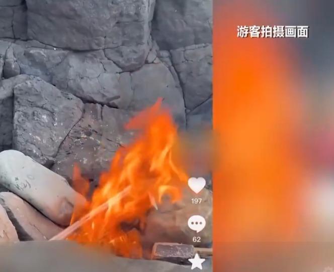 南碇島有人生火破壞生態。(《央視新聞》截圖)