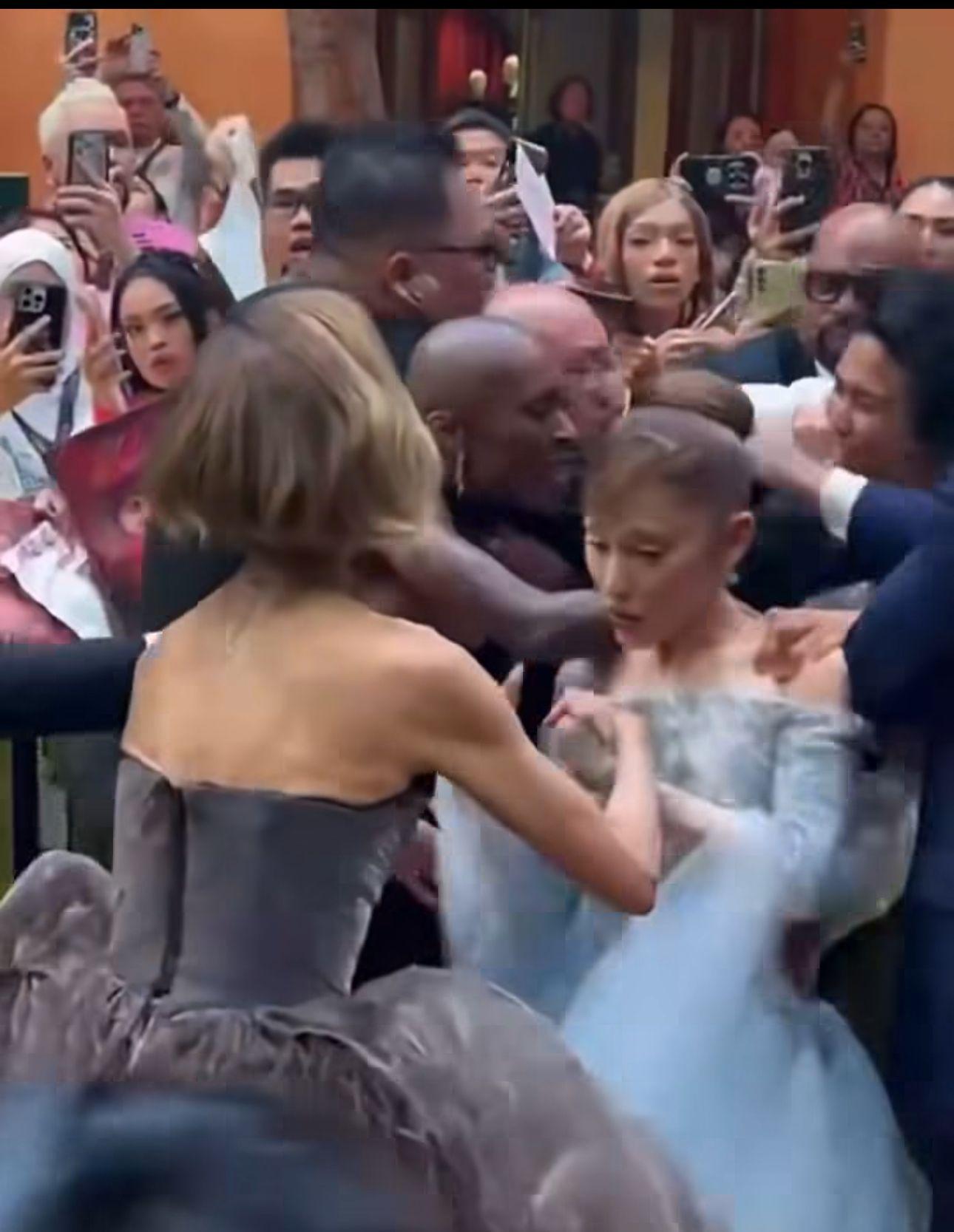 Ariana Grande遇狂迷埋身,拍檔Cynthia英勇護花。