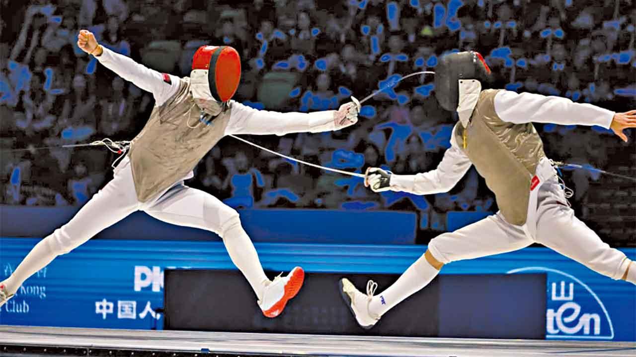 港隊蔡俊彥(左)與隊友打出水準。(鍾式明攝)