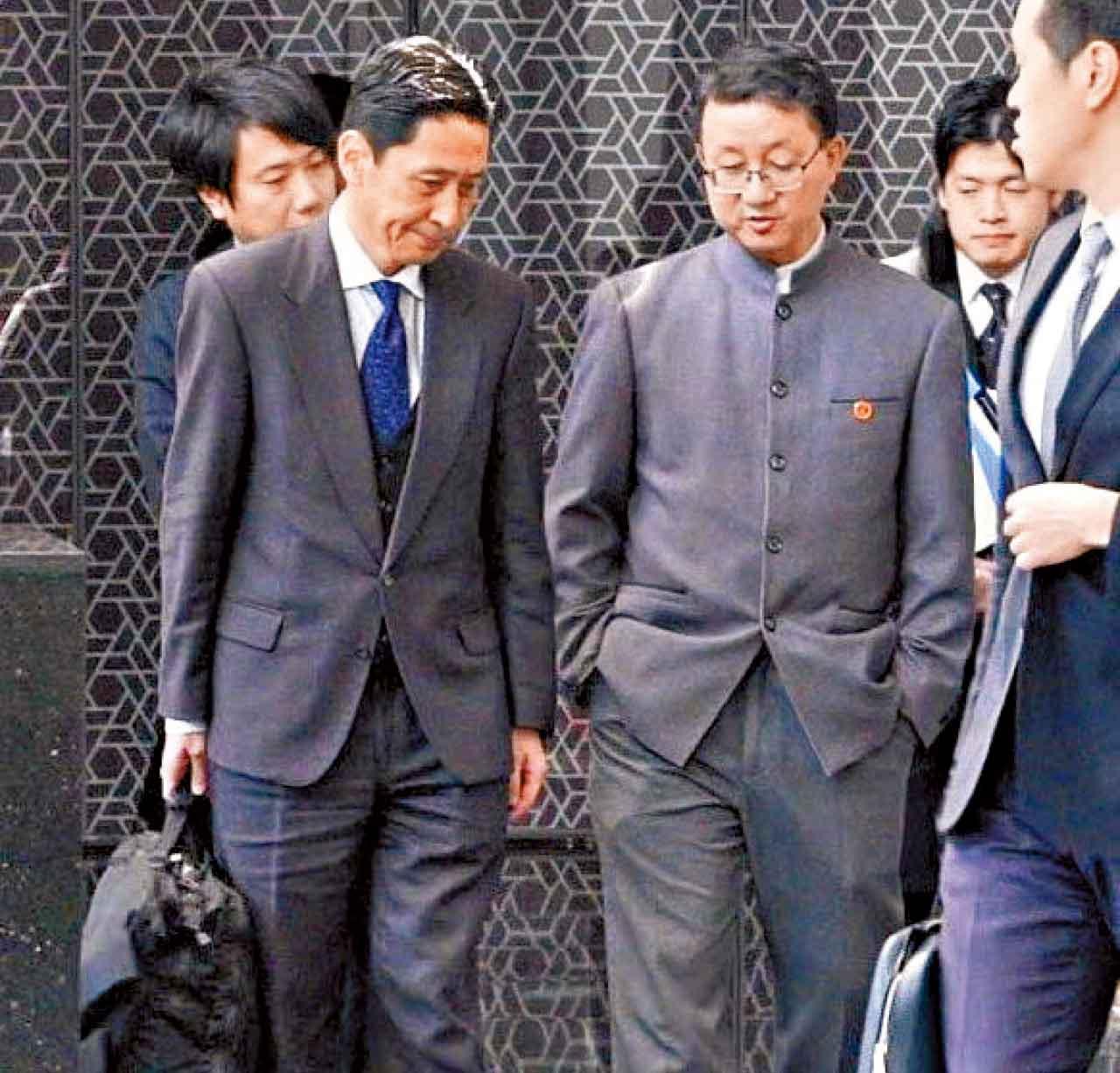 金井正彰(左)訪華徒勞無功。(路透社)