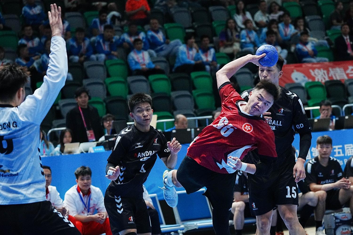 香港手球隊在八強擊敗廣東。(新華社)