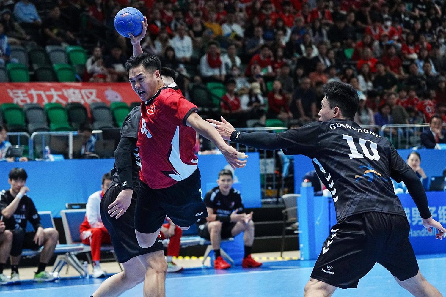 香港手球隊在八強擊敗廣東。(新華社)