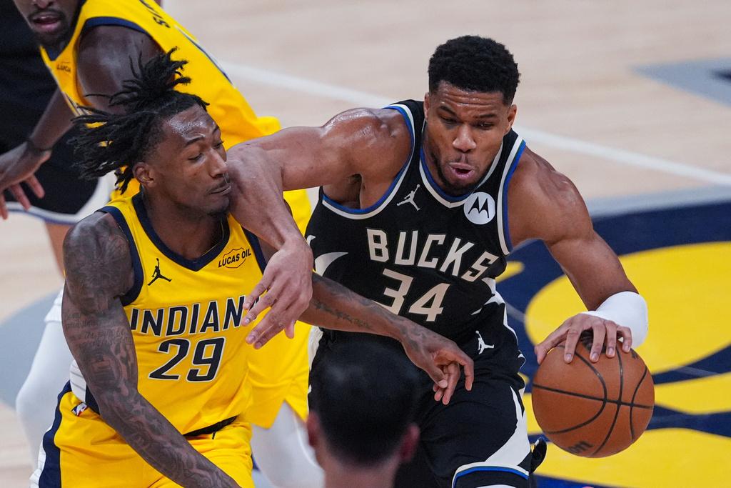 公鹿117:115擊敗溜馬。(美聯社)