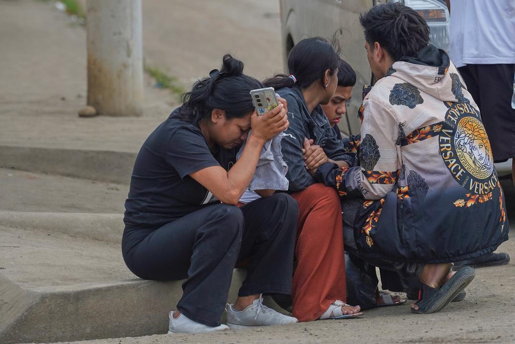 厄瓜多爾馬查拉(Machala)監獄日前暴動,有部份囚犯家屬十分擔憂。(美聯社)