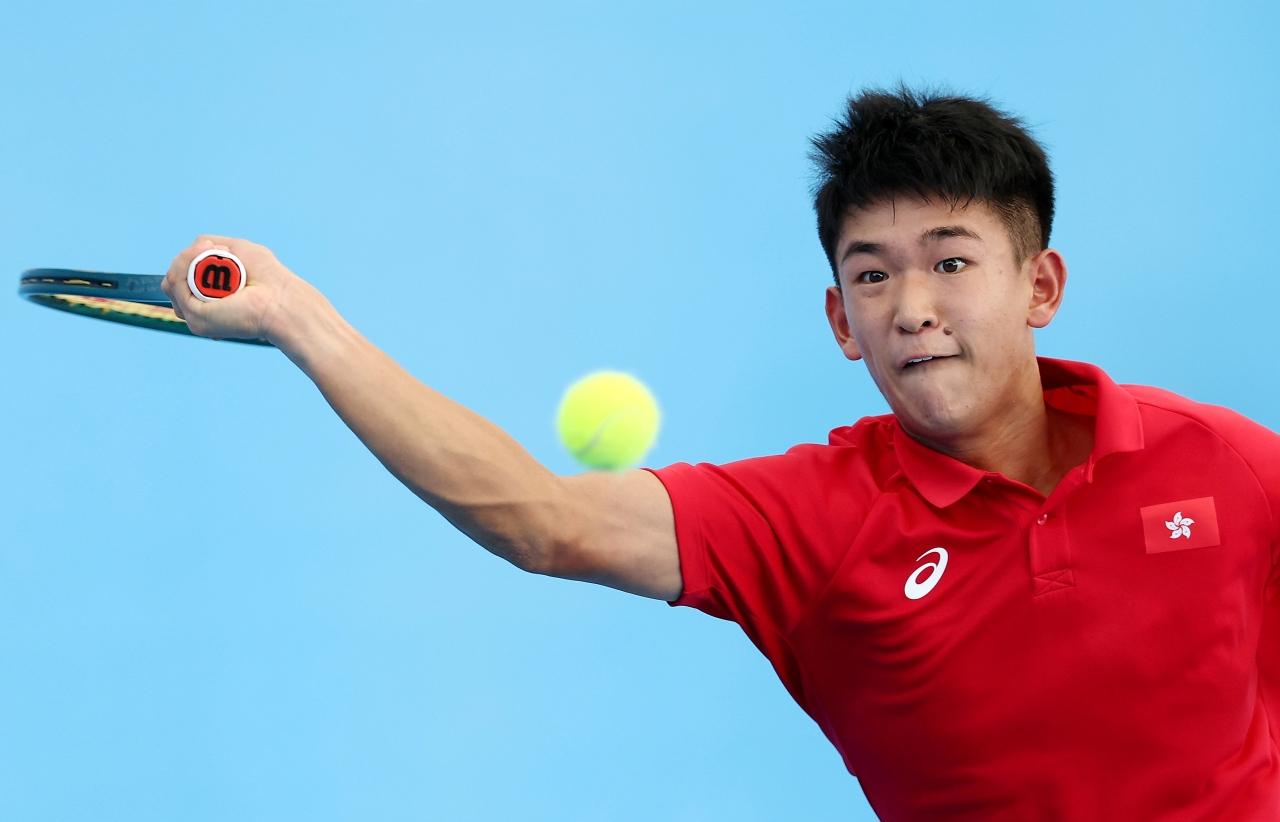 全運會|香港隊球手程銘燦以0比2不敵江蘇隊選手徐曠清。(新華社)