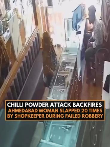 女子用頭巾遮面,扮顧客入珠寶店,店主招呼她。(互聯網)