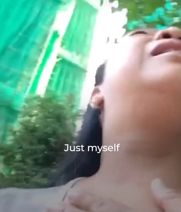 大埔宏福苑五級火,於宏福苑工作的菲傭Nerrissa Catabay初期得知起火後,隨即抱幼主BB狂跑23層樓,最終平安逃離到地面,她開直播通知在附近工作的其他鄰居及同鄉盡快離開。(影片截圖)