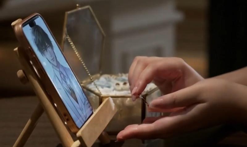 新娘在婚禮上佩戴擴增實境(AR)眼鏡,以投射出虛擬新郎的數碼影像,為新郎戴上戒指。(X)