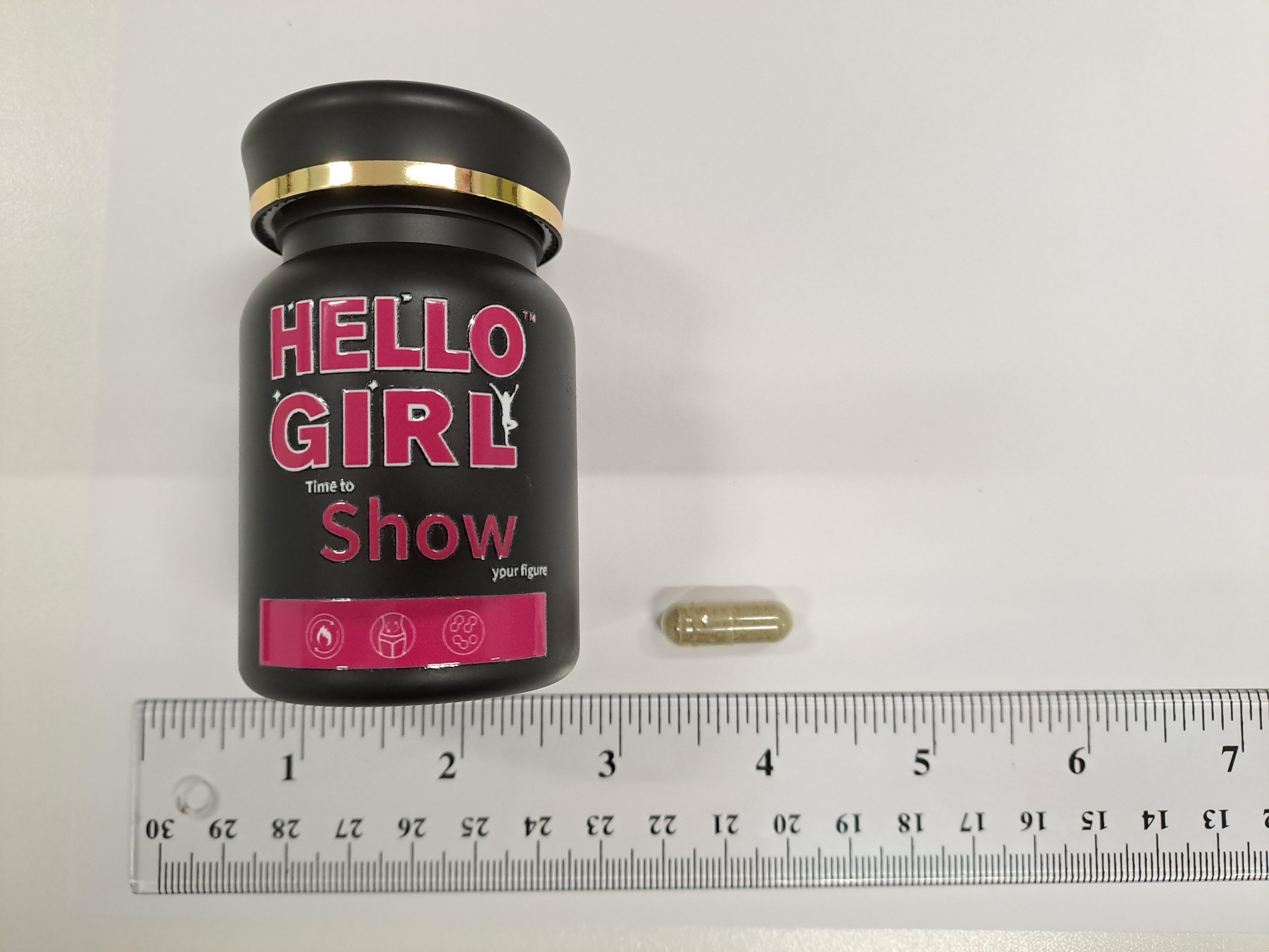 圖示盛載在黑色膠樽、包裝上標示「HELLO GIRL time to show your figure」的膠囊樣本。(政府新聞處)