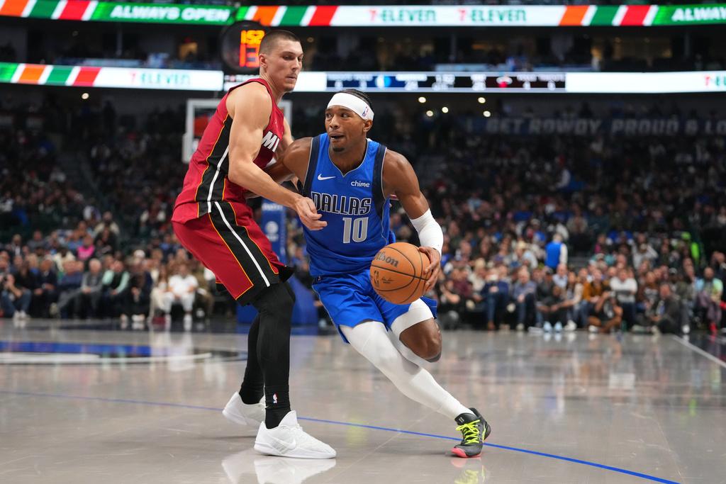 獨行俠118:108贏熱火。(美聯社)