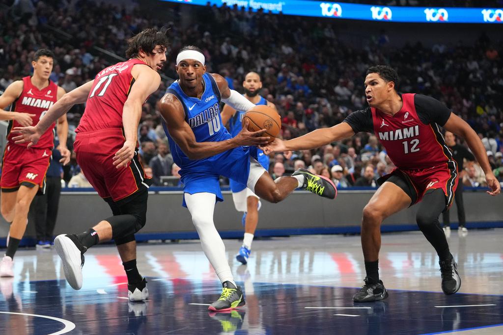 獨行俠118:108贏熱火。(美聯社)