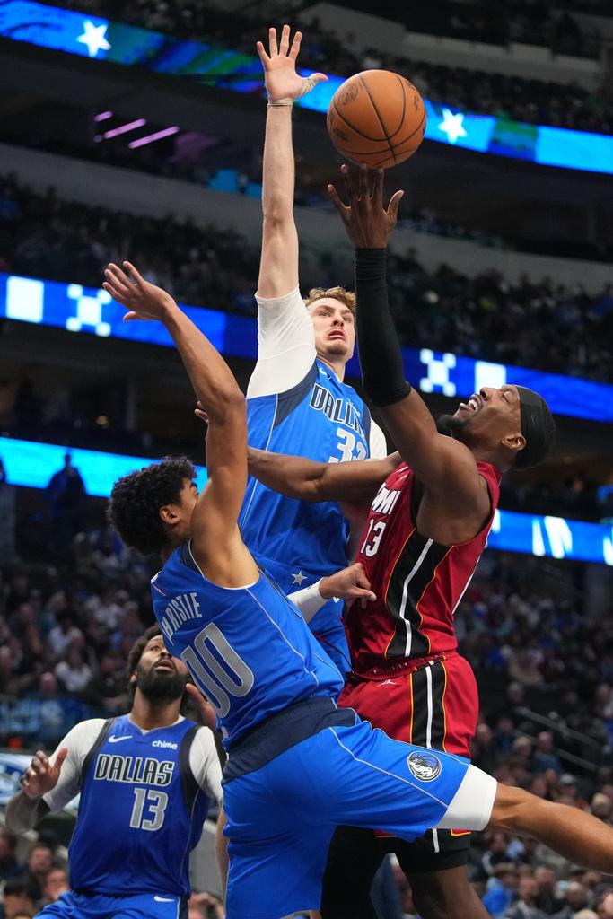 獨行俠118:108贏熱火。(美聯社)