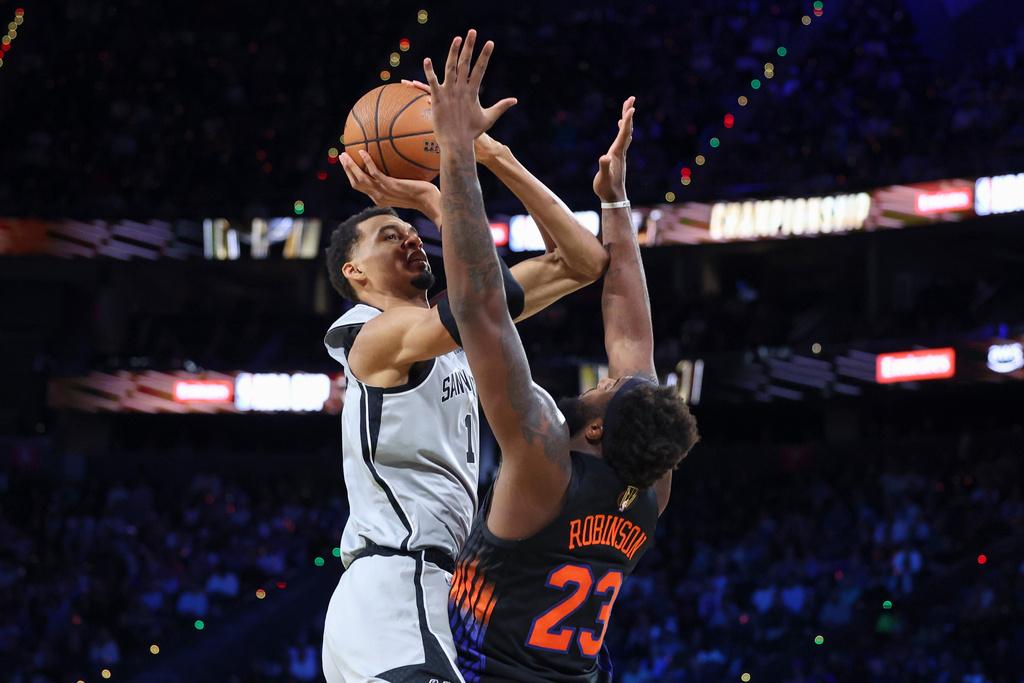 紐約人決賽124:113贏馬刺奪NBA冠軍。(美聯社)