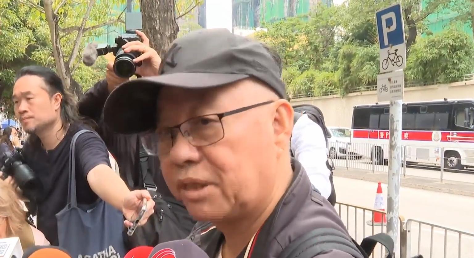 大埔宏福苑五級火|宏志閣未受大火波及,居民回家取重要物品。(有線電視新聞截圖)