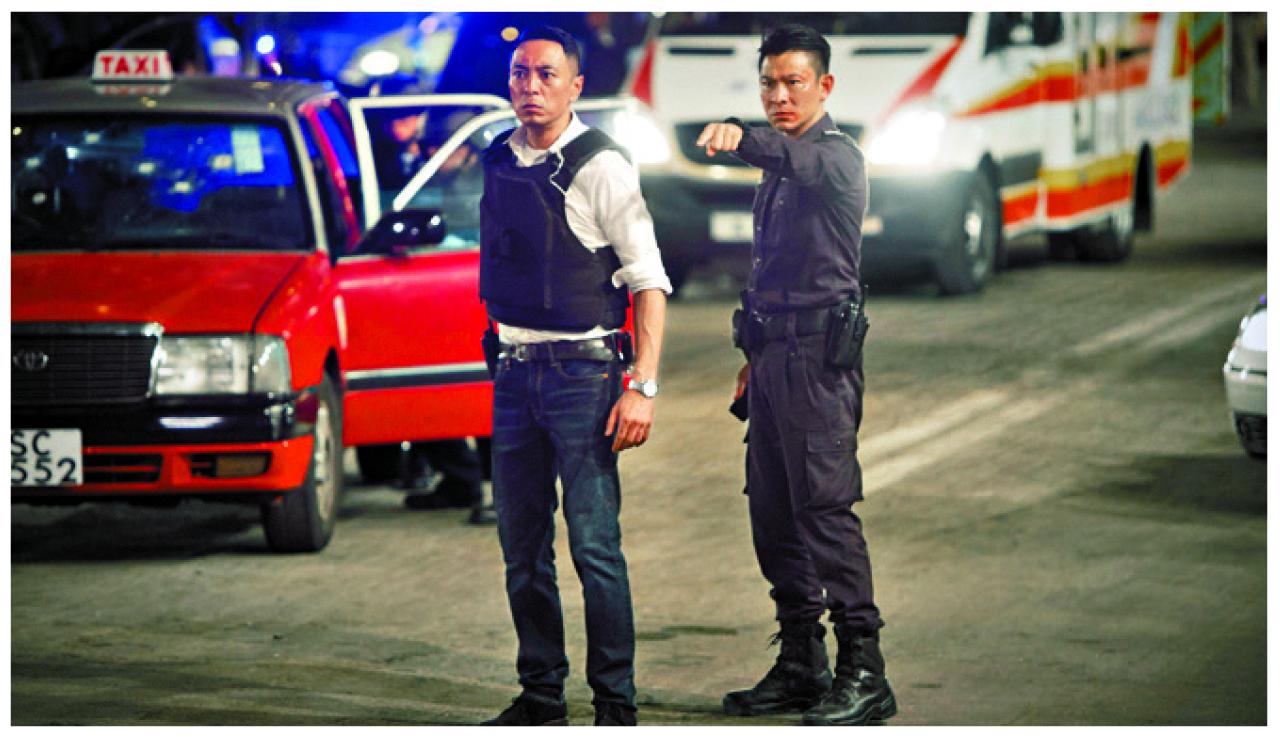 黑仔(左)在下月公映的《拆彈專家》中,演正氣警察。