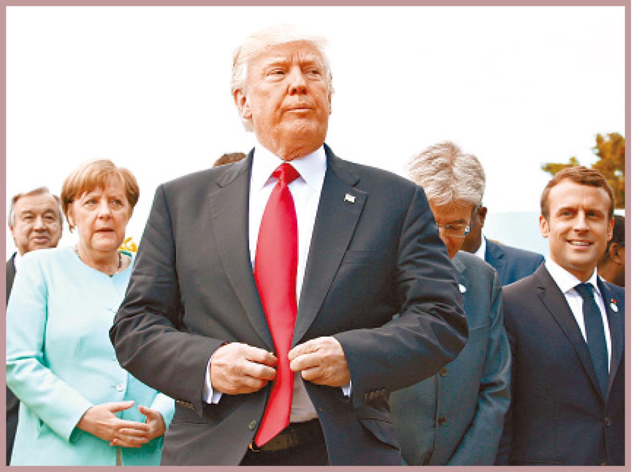 特朗普與G7領袖合照後離開,他似乎與其他人格格不入。