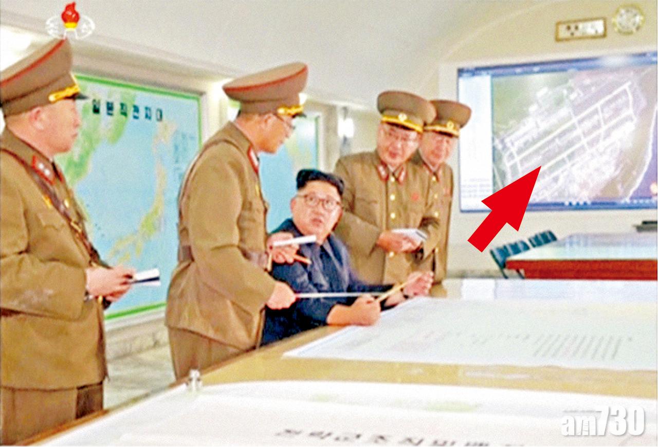 金正恩上月研究攻擊關島作戰計劃,牆上衛星圖被揭是Google的6年前舊圖。(路透社)
