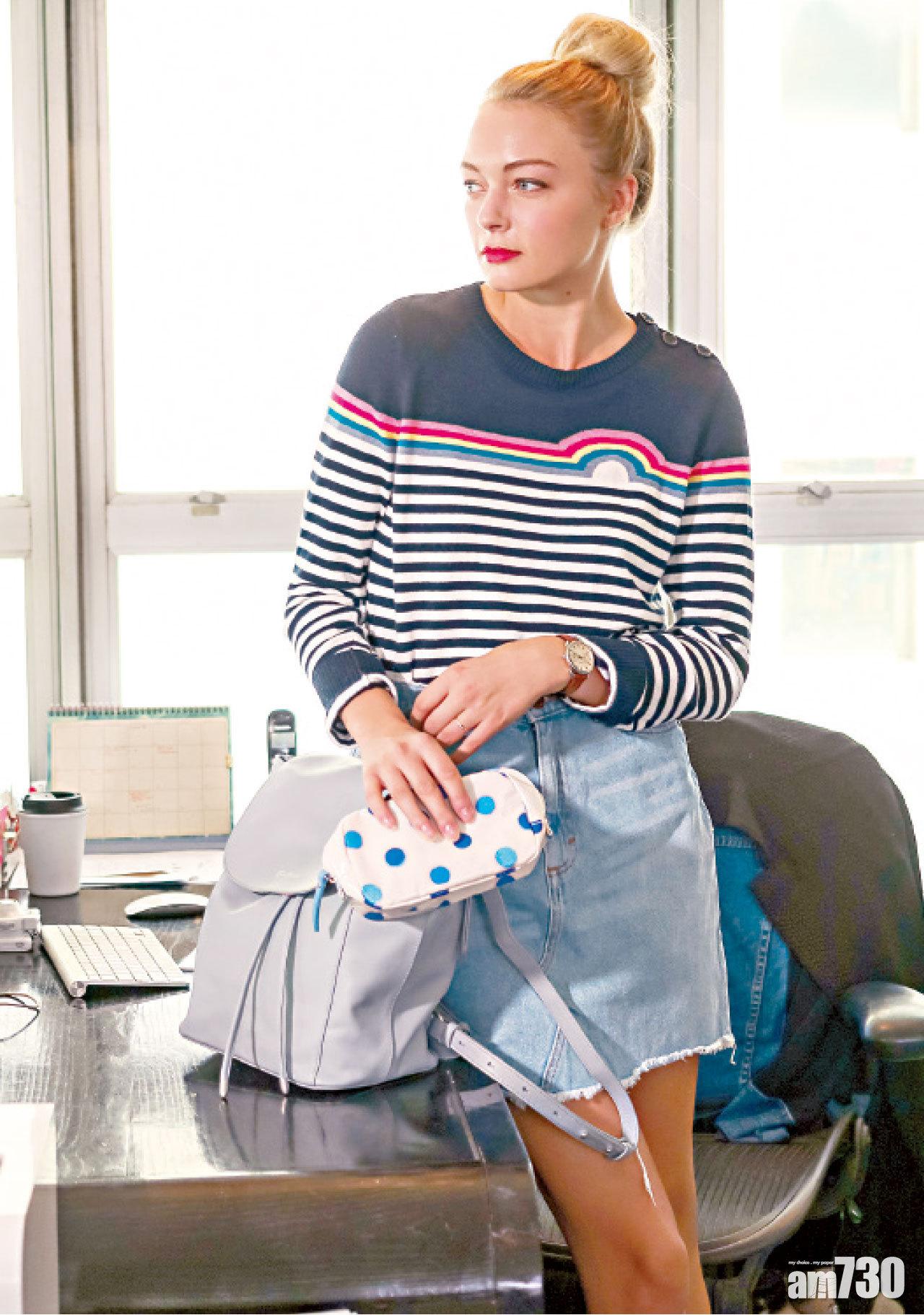 ‧Rainbow Stripe Navy Cotton
Blend Rainbow Jumper $1,190
‧Seafoam Blue Leather
Backpack $1,990
‧Inky Spot Make Up Case $190