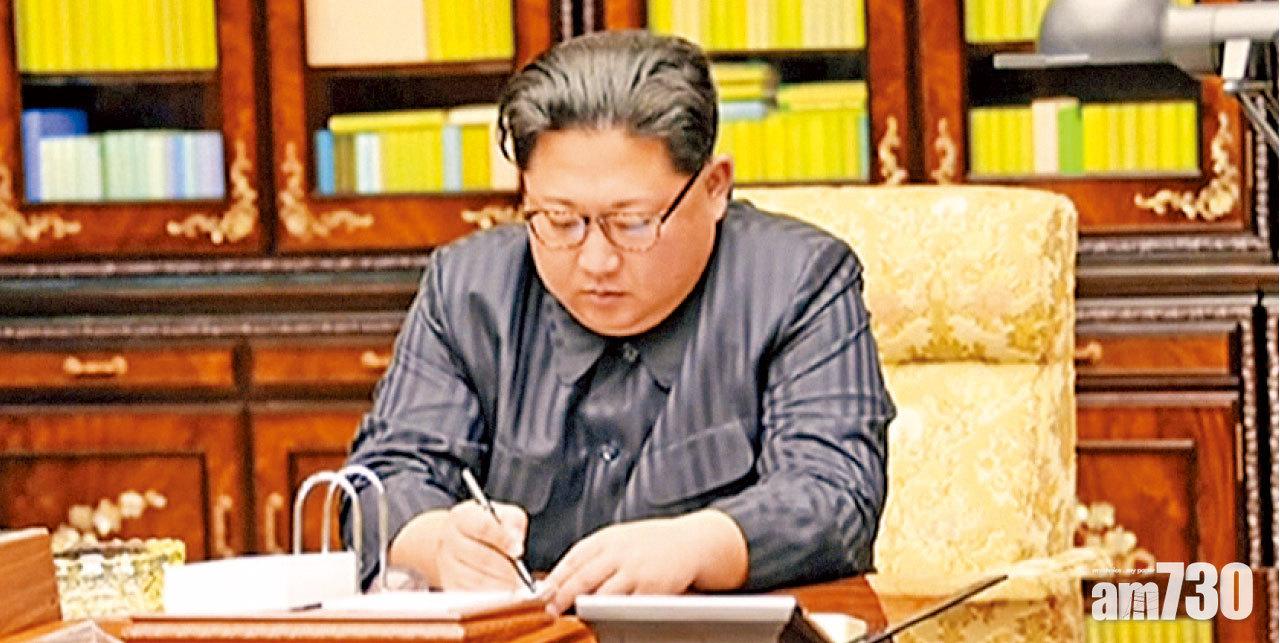 金正恩簽署發射導彈指令。(美聯社)