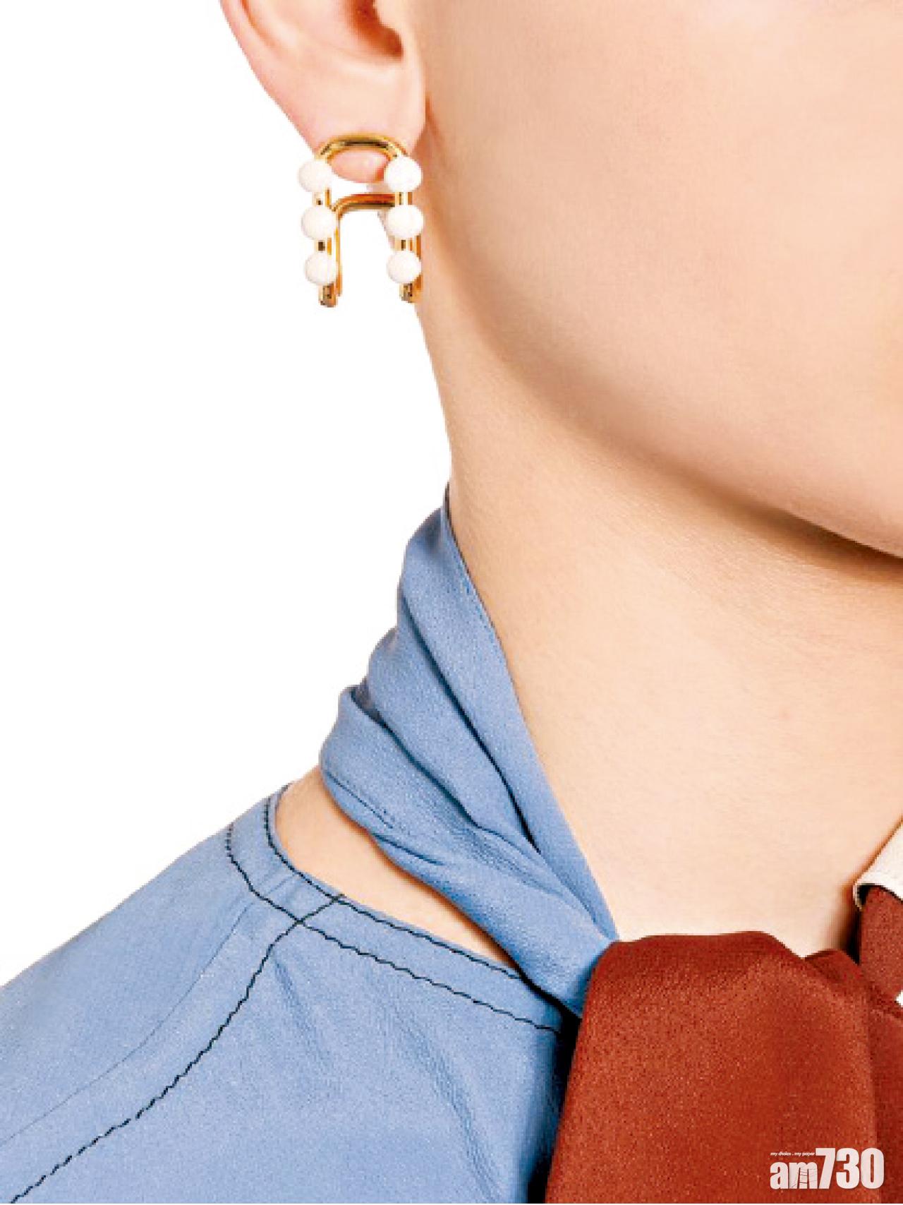 Earrings in metal $1,950 (original$3,900)