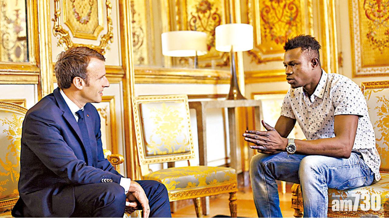 馬克龍於愛麗舍宮接見格沙瑪。(美聯社)