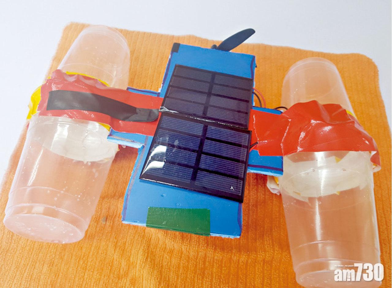 學生用膠杯及太陽能板創作玩意。