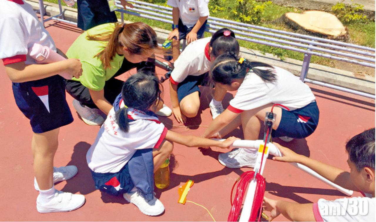 工程學+團隊精神,群策群力做「水火箭」。