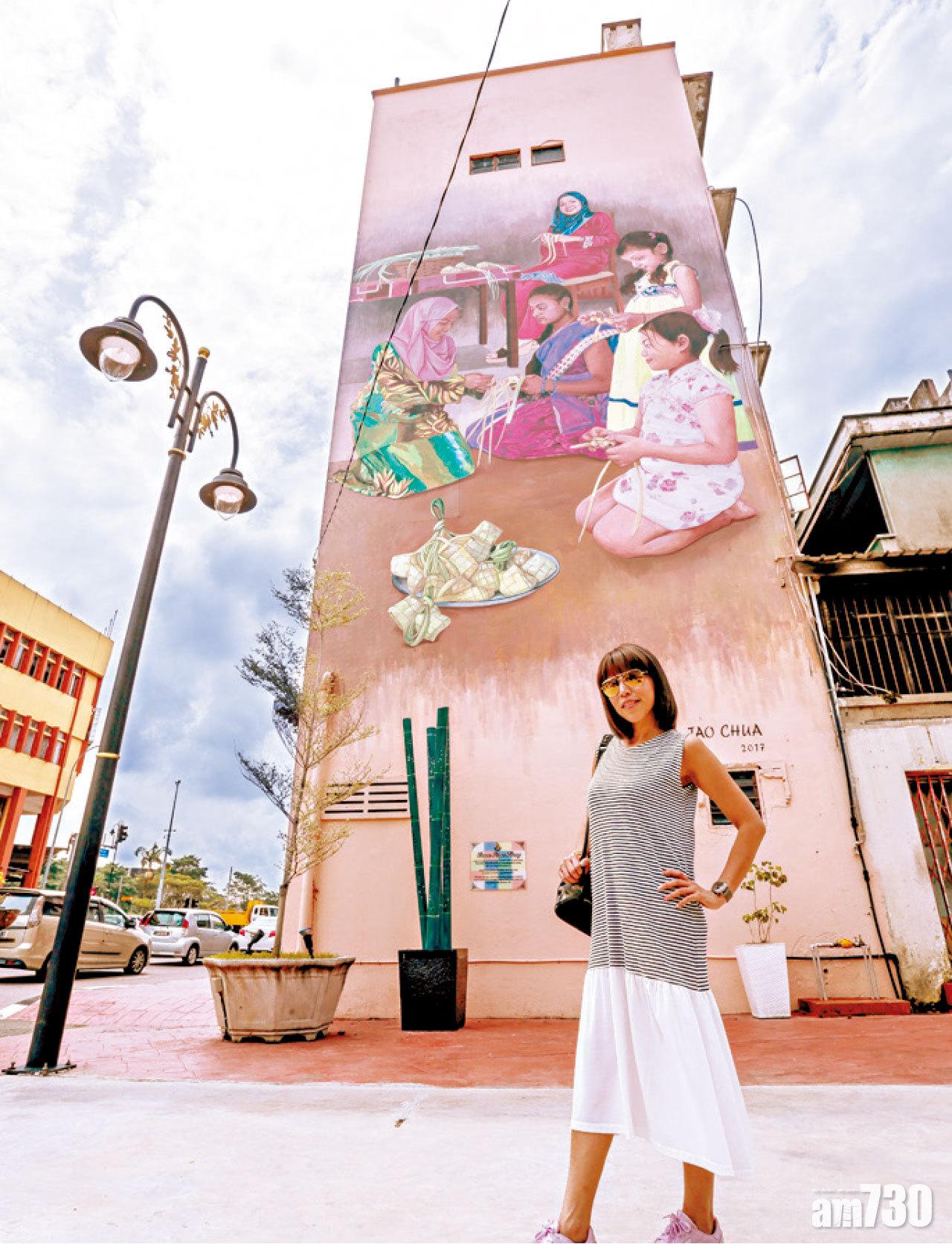 巨型大廈外牆壁畫成了居鑾必到的打卡熱點。