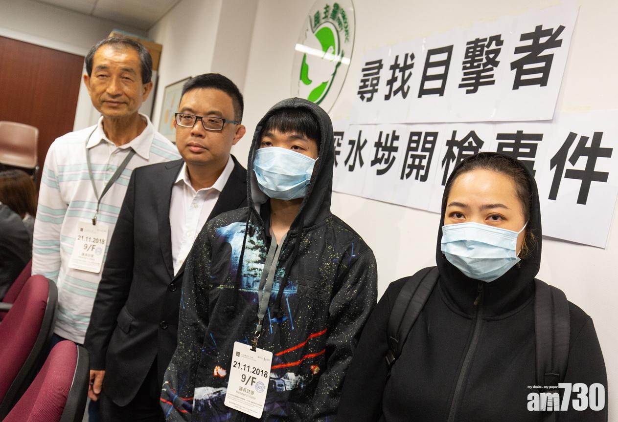 譚先生(左一)及周先生(右二)。(蘇文傑攝)